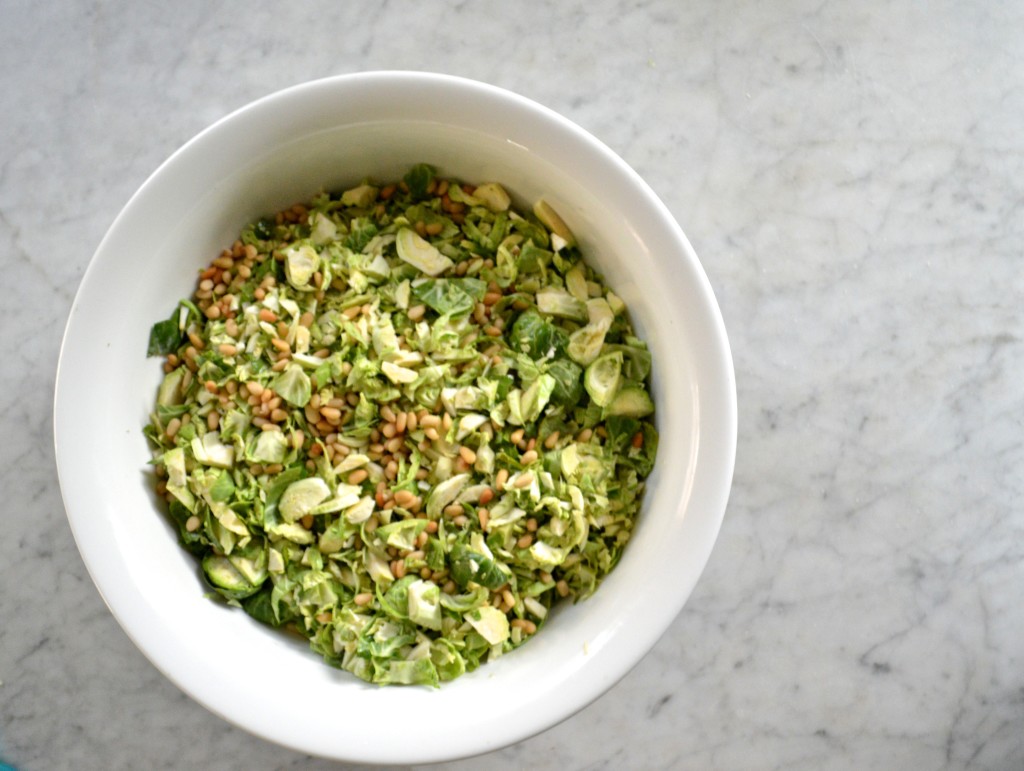 Shaved Brussel Sprout Salad with Pecorino + Pine Nuts via Simply Real Health